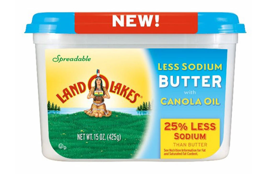 A Container Of Less Sodium Butter With Canola Oil From Land O