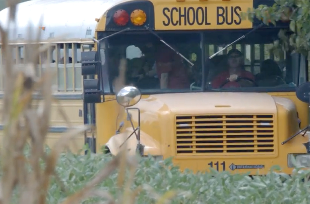 A School Bus Picking Up Children