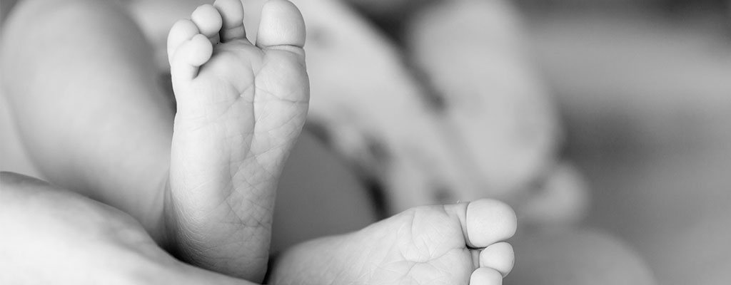 Black And White Image of Baby Feet